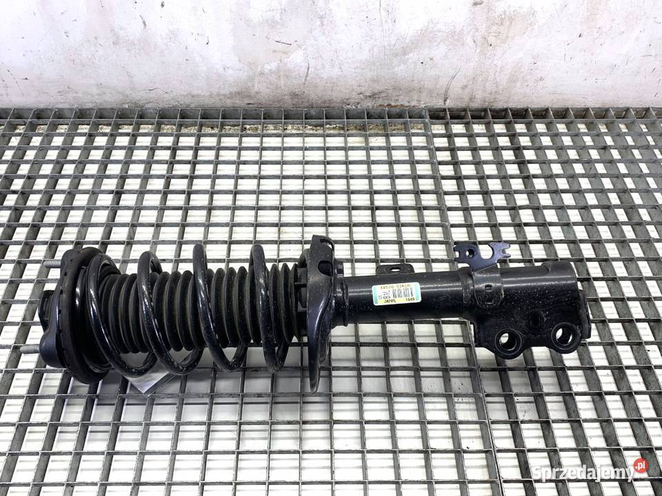 AMORTYZATOR LEWY PRZÓD ZE SPRĘŻYNĄ LEXUS LBX 15 osobowe
