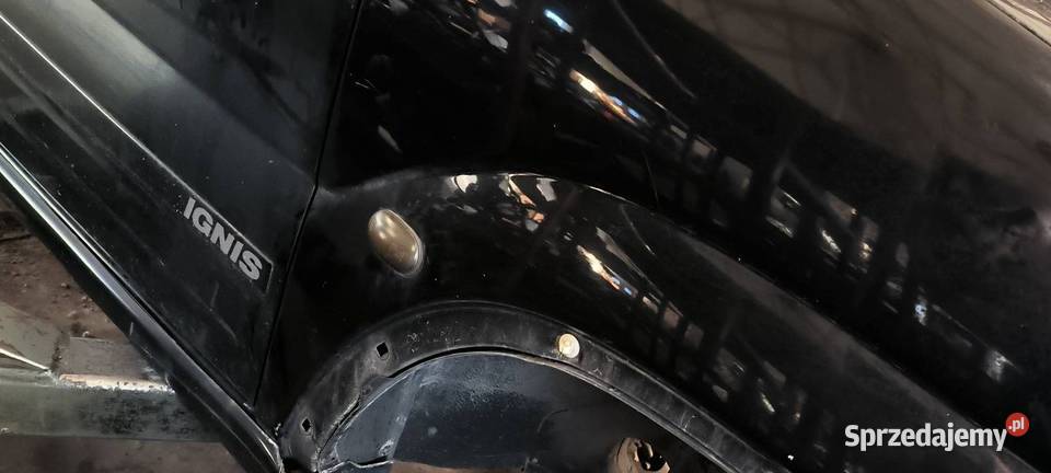 BŁOTNIK PRAWY PRZÓD SUZUKI IGNIS osobowe Lipno
