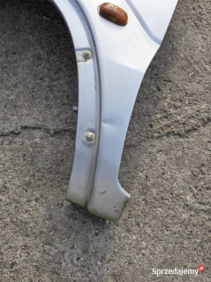 Suzuki Ignis FH 0003 błotnik błotniki przednie Legnica