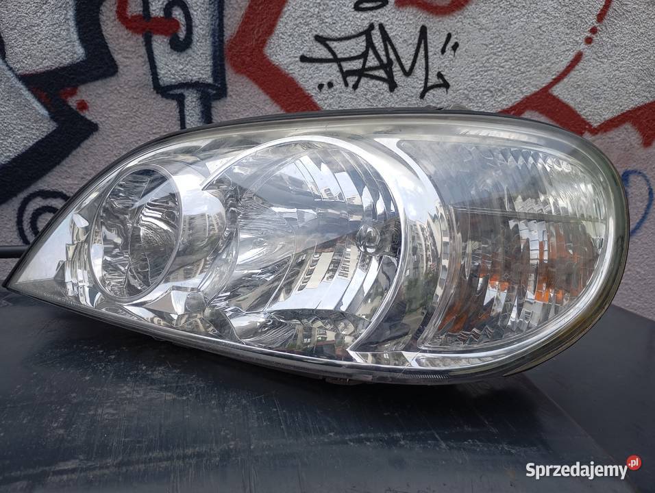 REFLEKTOR PRZEDNI LEWY KIA CARNIVAL 2903 CRDI Carnival