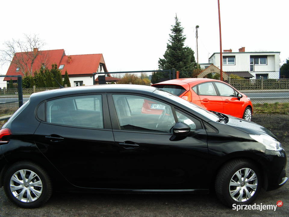 Peugeot 208 12 Etylina 2017 r czujnik zmierzchu Motoryzacja Września
