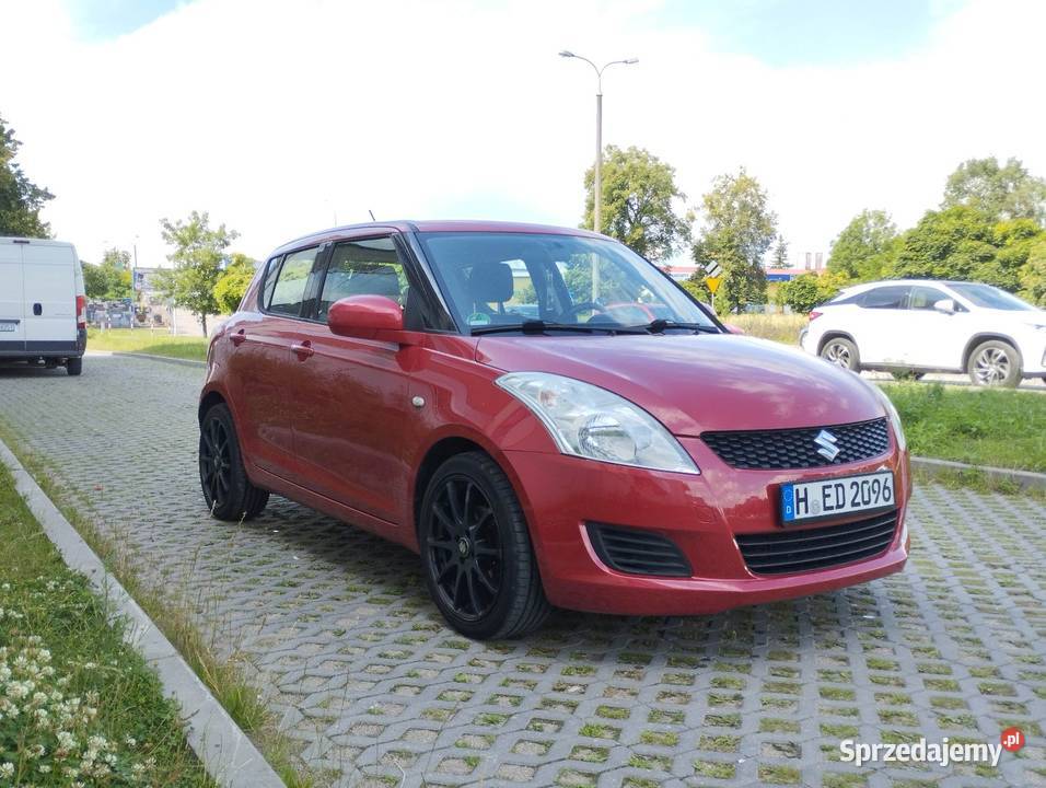 Suzuki Swift lift 13 benzyna świeży import nieuszkodzony warmińsko-mazurskie