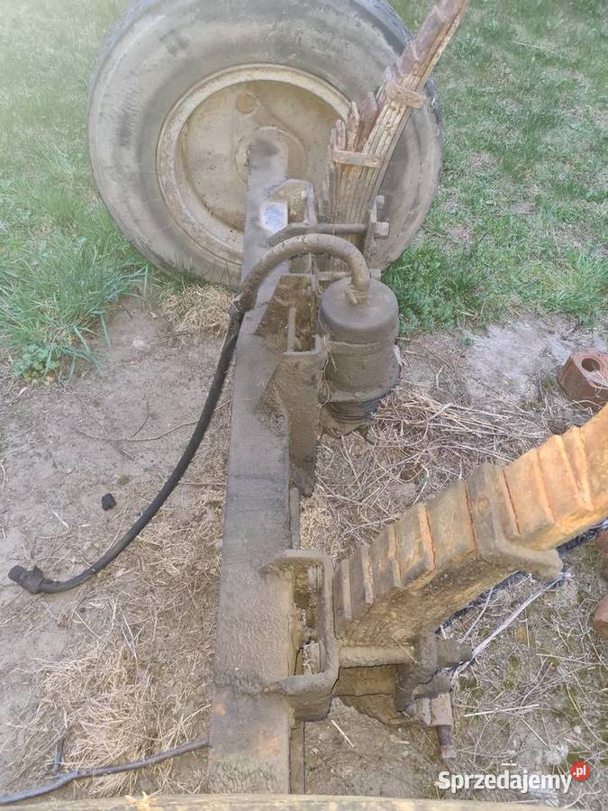 oś przyczepy z resorami