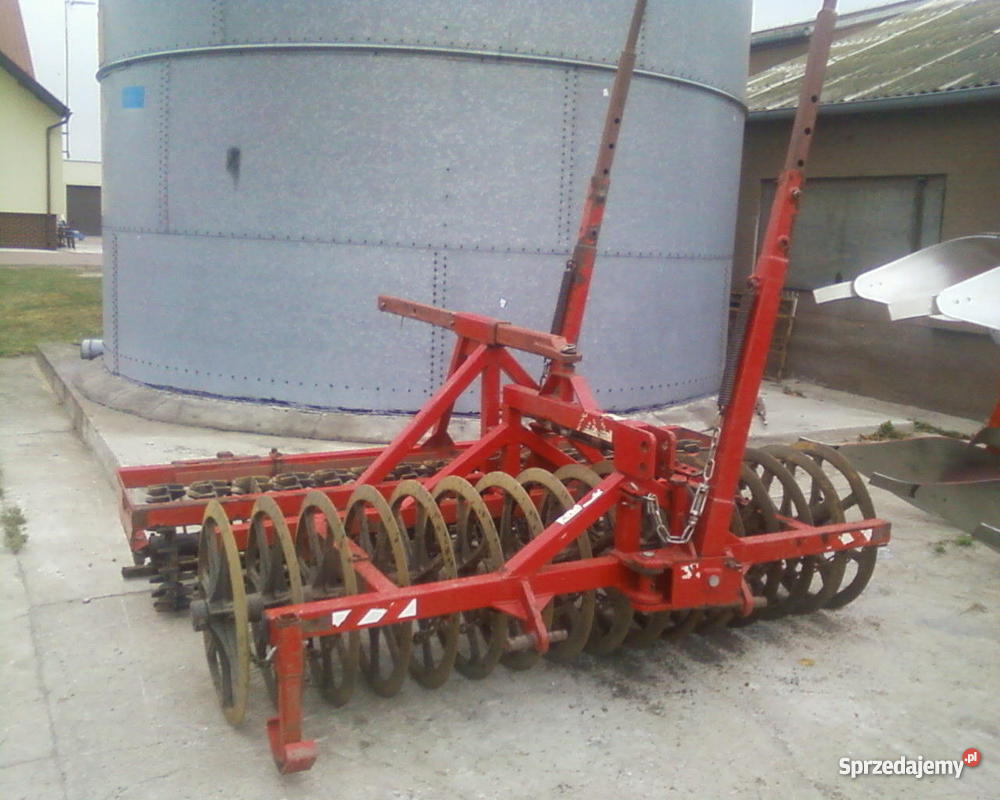 Pług obrotowy KUHN Multi Master 110 i wał Campbe Września