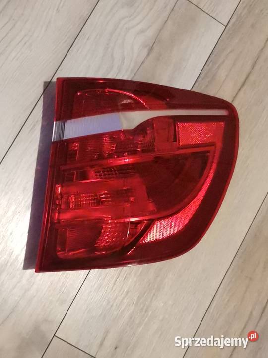 BMW X3 F25 1015 PRAWA LAMPA W BŁOTNIK TYŁ Lampy tylne