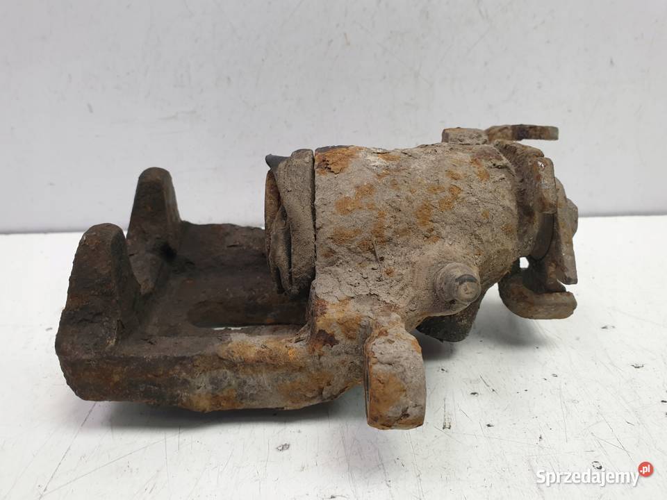 Volvo S40 V40 ZACISK HAMULCOWY Lewy tył kierowcy Rudka