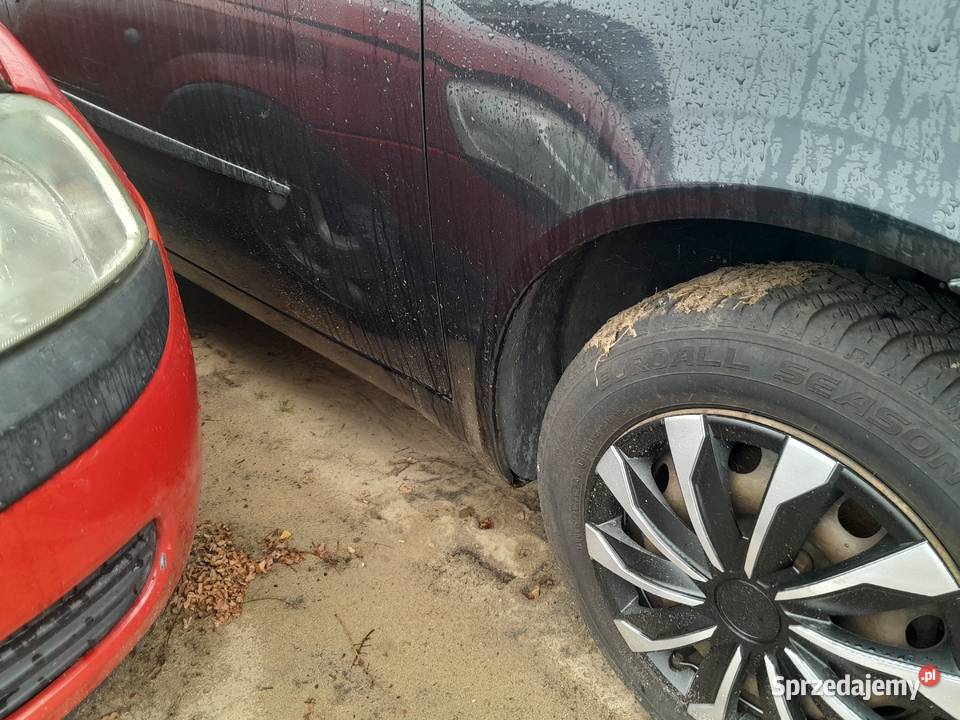 Fiat Punto 12 benzyna 60 2004r z de klima czarny Wronki