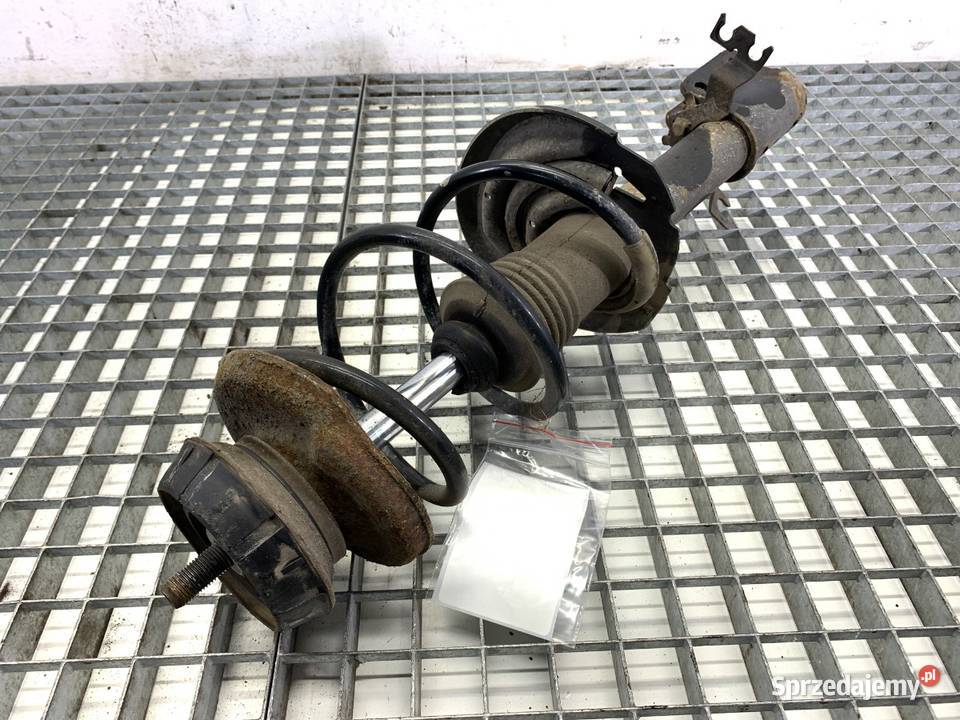 AMORTYZATOR PRAWY PRZÓD ZE SPRĘŻYNĄ DACIA