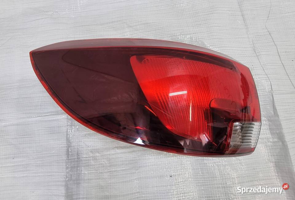 OPEL ASTRA V K LAMPA TYLNA TYŁ LEWA W BŁOTNIK Zestawy części blacharskich