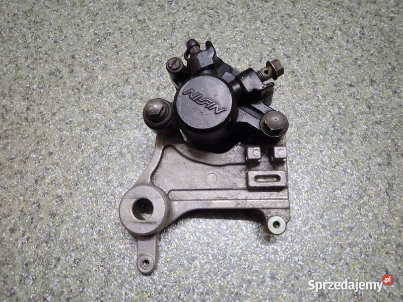 ZACISK HAMULCA HAMULCOWY TYŁ JARZMO HONDA NX 650