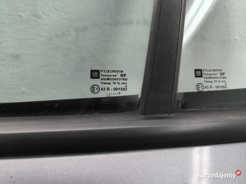 DRZWI LEWY TYŁ Z163 OPEL ASTRA H KOMBI