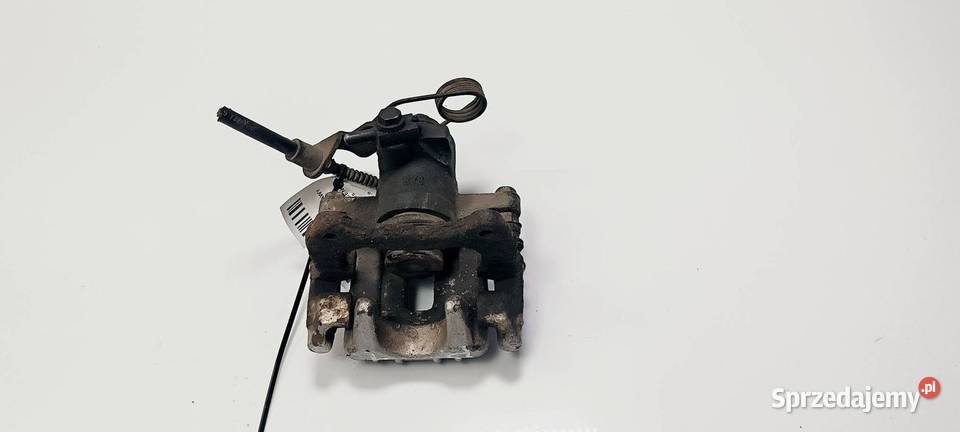 ZACISK HAMULCOWY TYŁ PRAWY VOLKSWAGEN PASSAT B5 osobowe Lipno