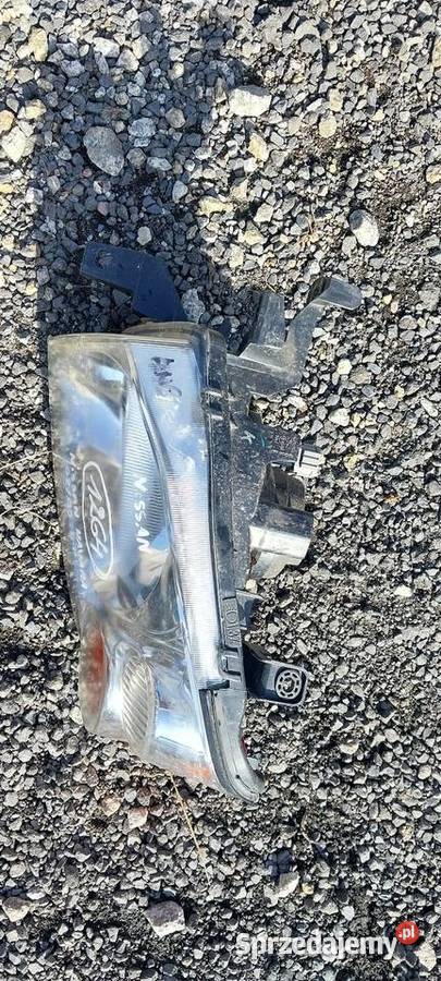 Nissan Navara d22 2002 2003 2004 2005 lampa lewa osobowe Części samochodowe dolnośląskie Byków