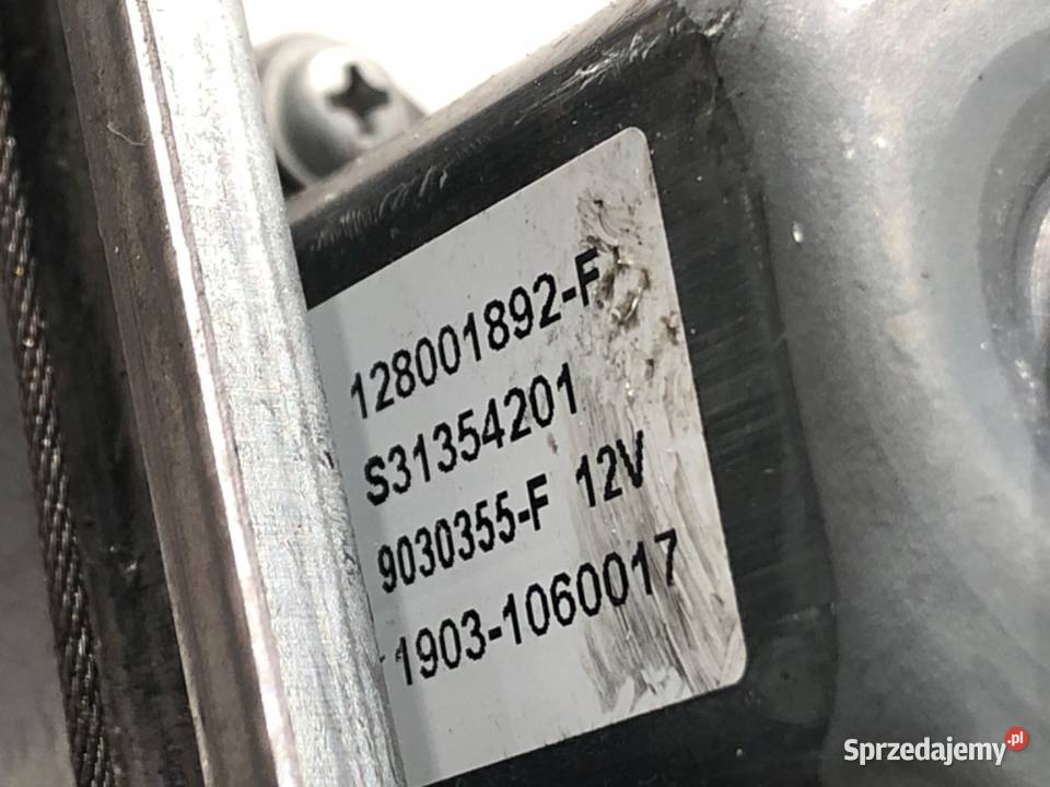 PODNOŚNIK SZYBY LEWY TYŁ DACIA DUSTER 128001892 osobowe Mechanizmy opuszczania szyb