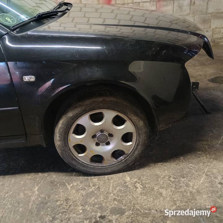 Blotnik Audi A6 C5 kod lak LY9B Bychawa