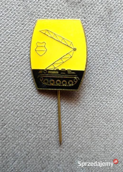 ODZNAKA Z WIZERUNKIEM DZWIGU NA PODSTAWIE Piszczac