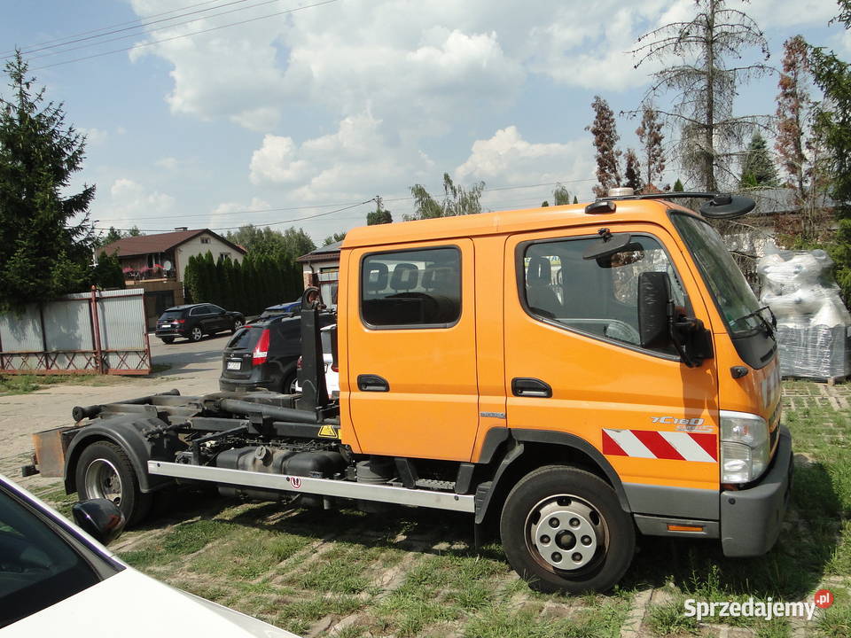 Hakowiec Mitsubishi Canter pomarańczowy Specjalne Stasi Las sprzedam