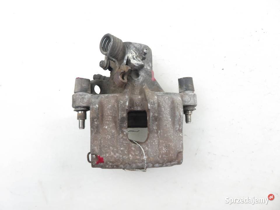 ZACISK LEWY TYŁ MAZDA 3 sedan BK 23 sprzedam