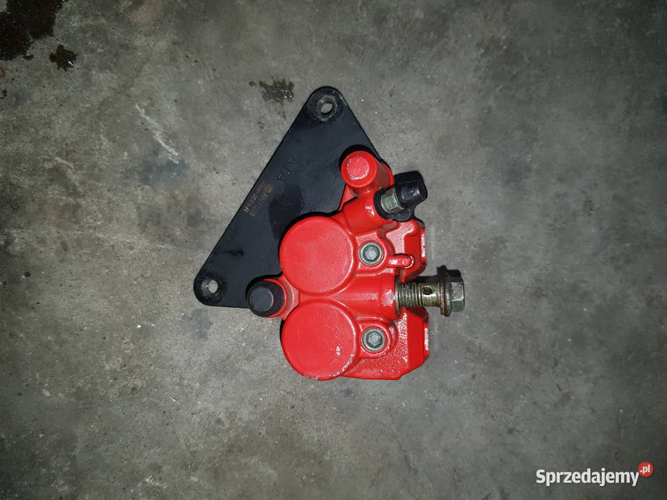 Przedni zacisk hamulcowy z klockami Sym Crox Zaciski Radzyń Podlaski