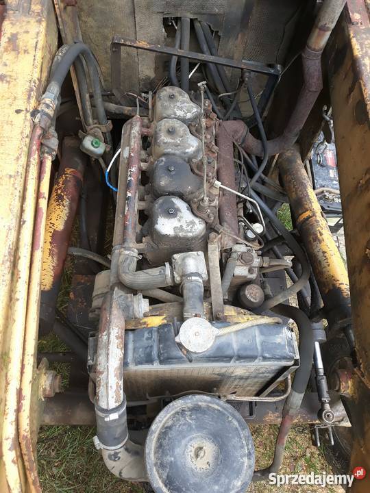 koparko ładowarka Ostrówekwidły do palet3 łyżki nie sprzedam