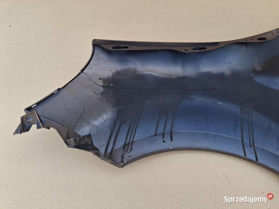RENAULT MODUS BŁOTNIK PRAWY PRZÓD ORYGINAŁ