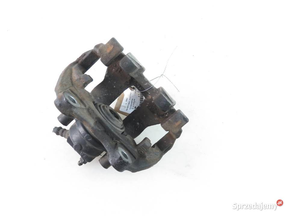 ZACISK LEWY TYŁ MERCEDES 211 32 CDI