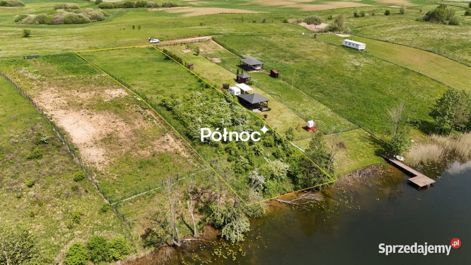 Siedliska działka z linią brzegową jeziora polna