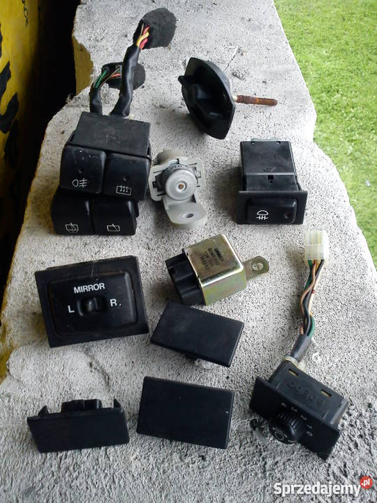 Guziki przełączniki zaślepki Suzuki Swift Mk3 13 Wyposażenie wnętrza Przemyśl