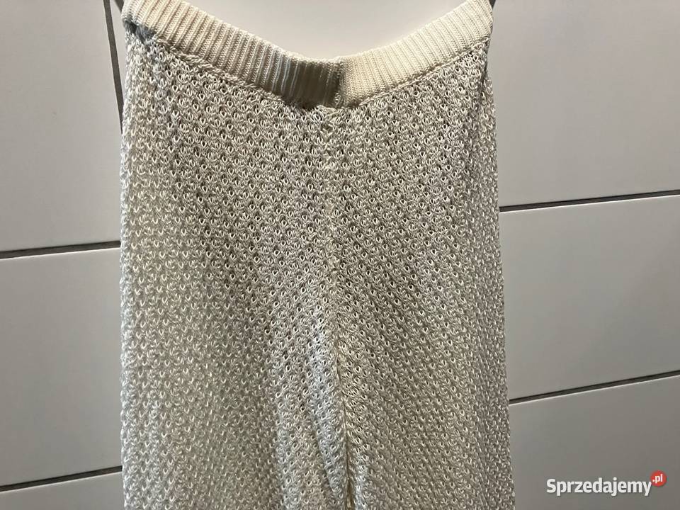 kremowe dzianinowe bawełniane spodnie xs 34 Toruń