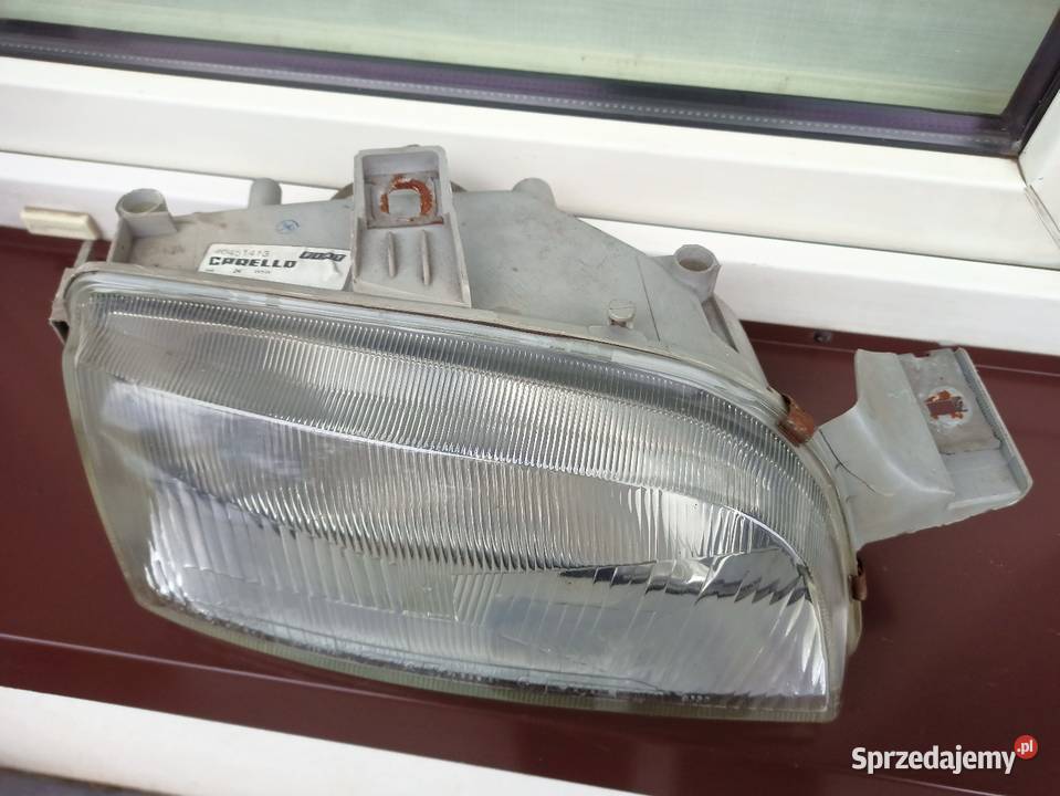 Fiat Punto 1 I lampa przednia prawa reflektor