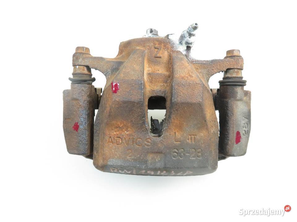 ZACISK LEWY PRZÓD TOYOTA RAV 4 III 20