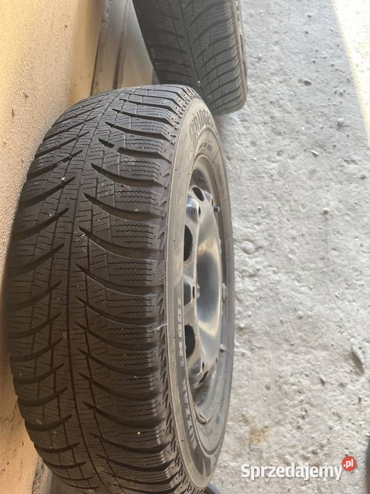 Opony zimowe stalowe felgi 16570 R14 91T Koła