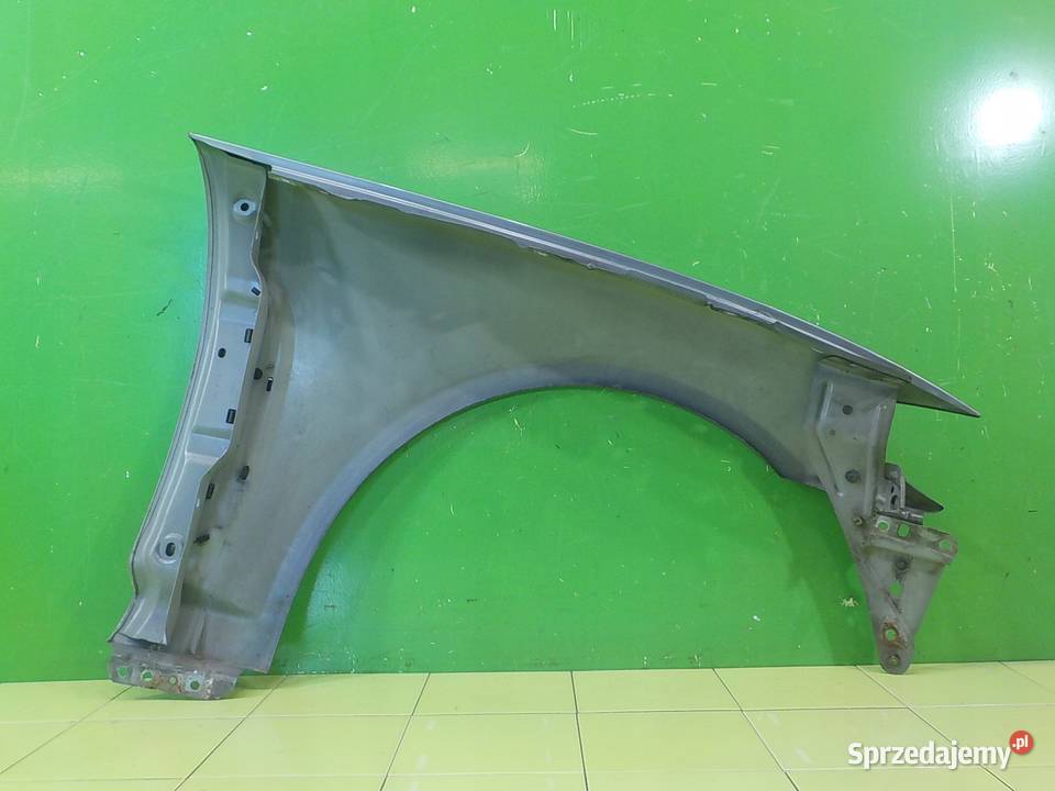 JAGUAR XF I 09r SEDAN 4D blotnik lewy przod