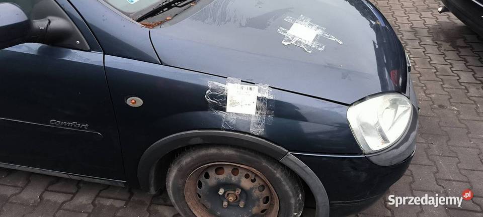 BŁOTNIK PRAWY PRZÓD OPEL CORSA Z36U Pozostałe Lipno