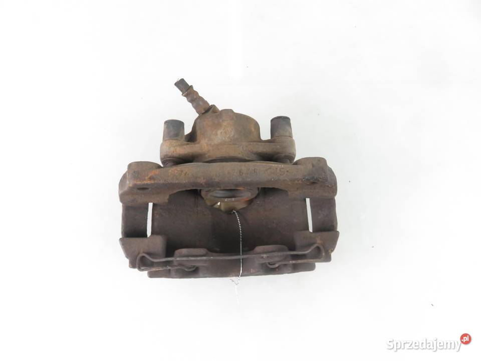 ZACISK LEWY PRZÓD DACIA DUSTER 16 16V małopolskie