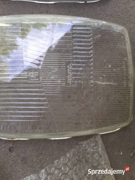 MERCEDES W114 W115 SZKŁA REFLEKTORÓW PRZÓD RAMKA Toruń