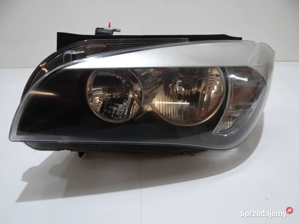 LAMPA LEWA PRZEDNIA BMW X1 E84 OE 7357447 Strzyżewice sprzedam