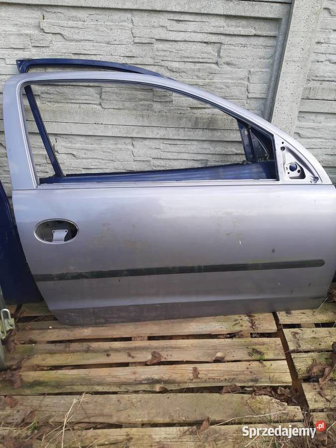 Opel Corsa C prawe przednie 3 drzwi Z166 osobowe Ksawerów