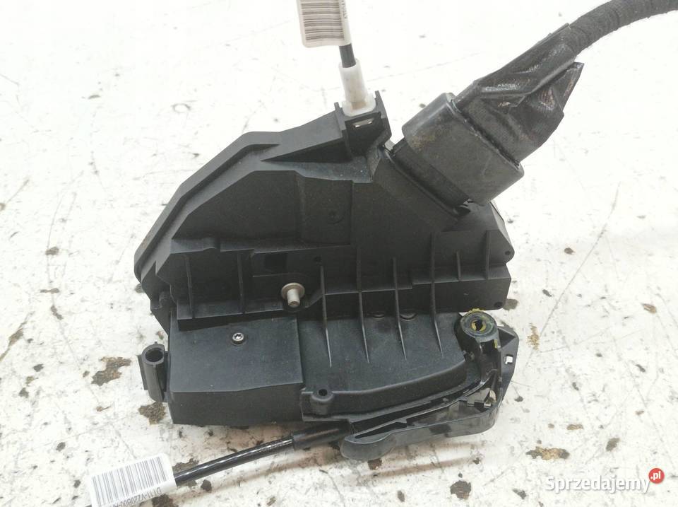 ZAMEK DRZWI PRAWY PRZÓD EUROPA AM5AU21812BF Ford