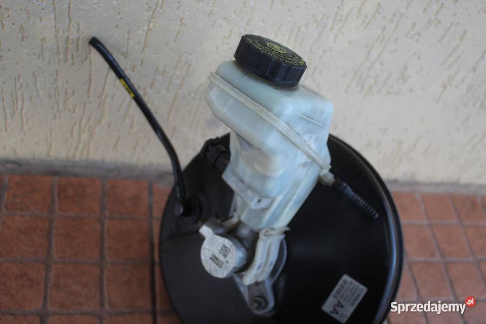 SERWO POMPA HAMULCOWA OPEL CORSA D 10 55701939