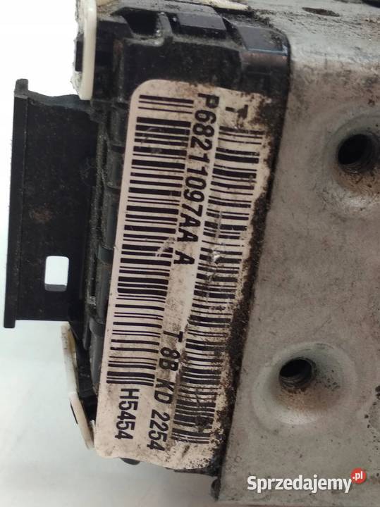 ZAMEK DRZWI LEWY PRZÓD P68211097AA Jeep Cherokee