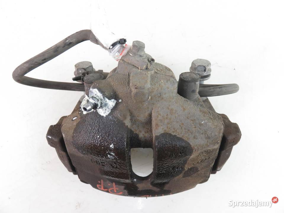 ZACISK PRAWY PRZÓD VW PASSAT B7