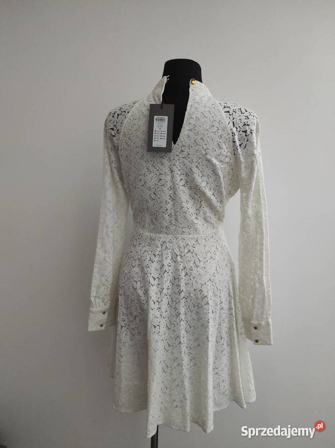 biała elegancka sukienka vero moda z podszewką Rozmiar 42(XL) Białka sprzedam