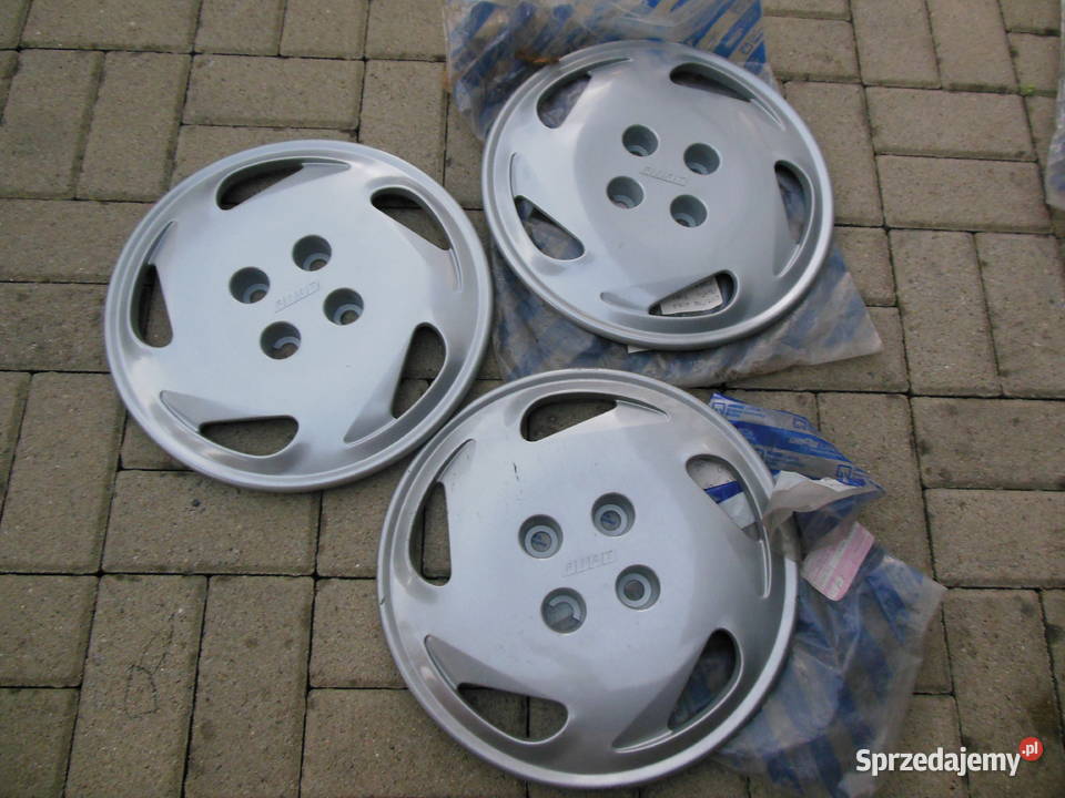 ORYGINALNY KOŁPAK KOŁA FIAT PUNTO MK1 14 NOWY Opony i felgi Kozy