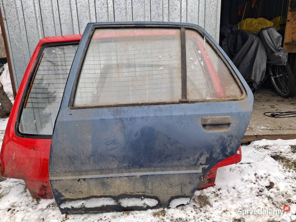 Peugeot 205 oś tylna drzwi tapicerka plastiki Żdżenice sprzedam