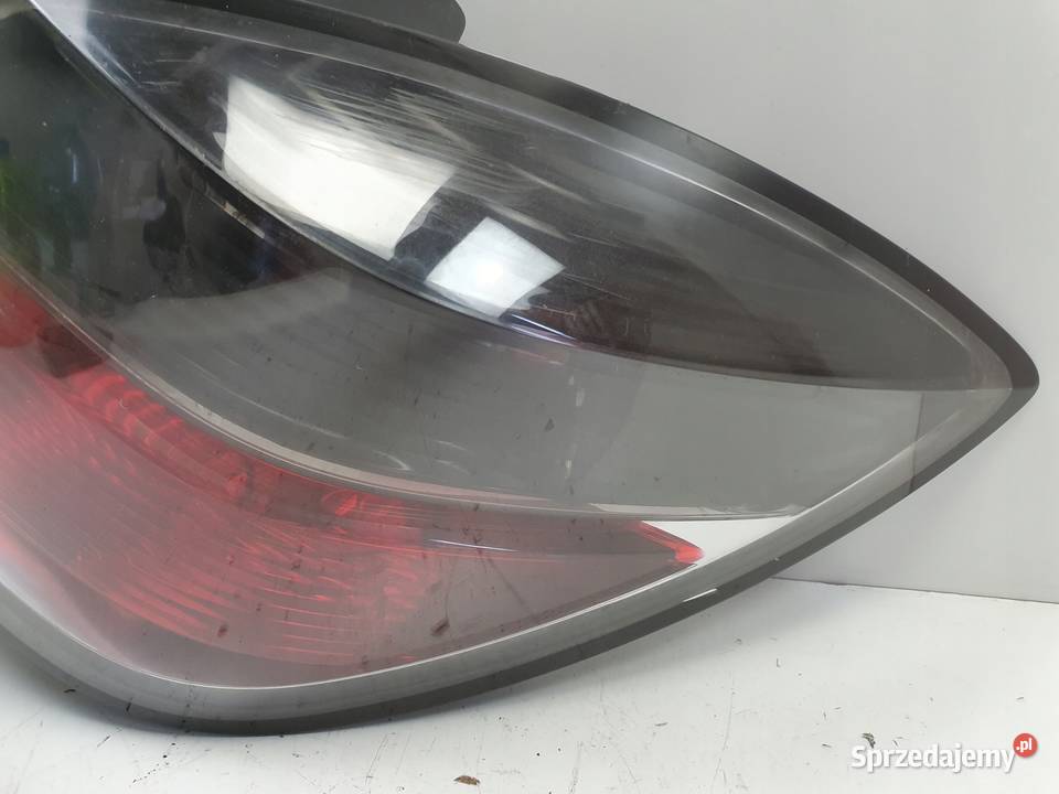 LAMPA PRAWA Opel Astra H III lift HB 0610r TYLNA