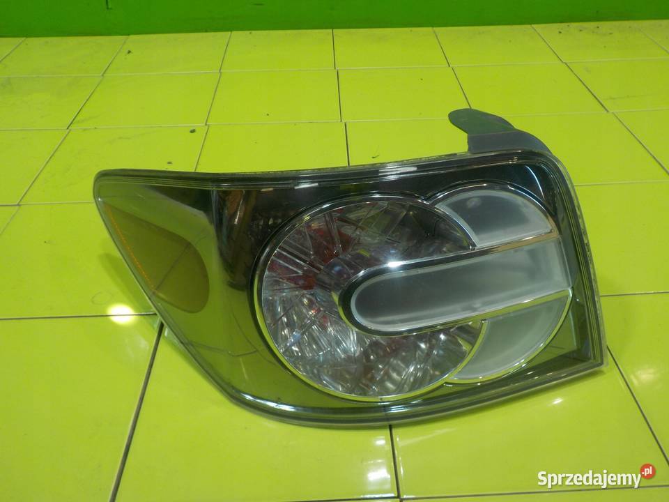 MAZDA CX7 LIFT 22 D 09r lampa lewa tyl Suków