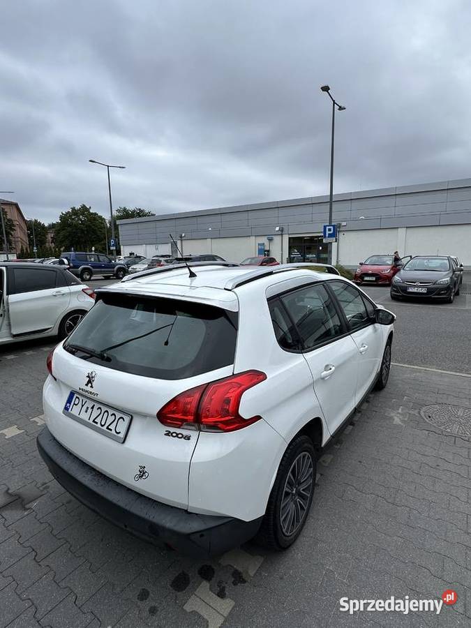 Peugeot 2008 12 Benzyna 2013 r Biały garażowany 1199cm3 Poznań