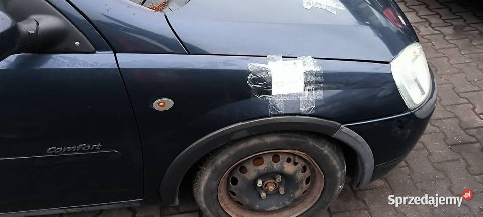 BŁOTNIK PRAWY PRZÓD OPEL CORSA Z36U Lipno