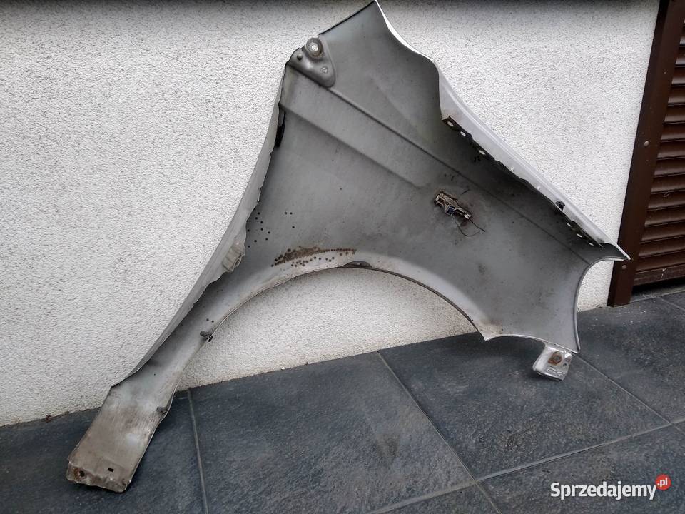 Toyota Yaris I LIFT FL błotnik lewy kierowcy osobowe łódzkie